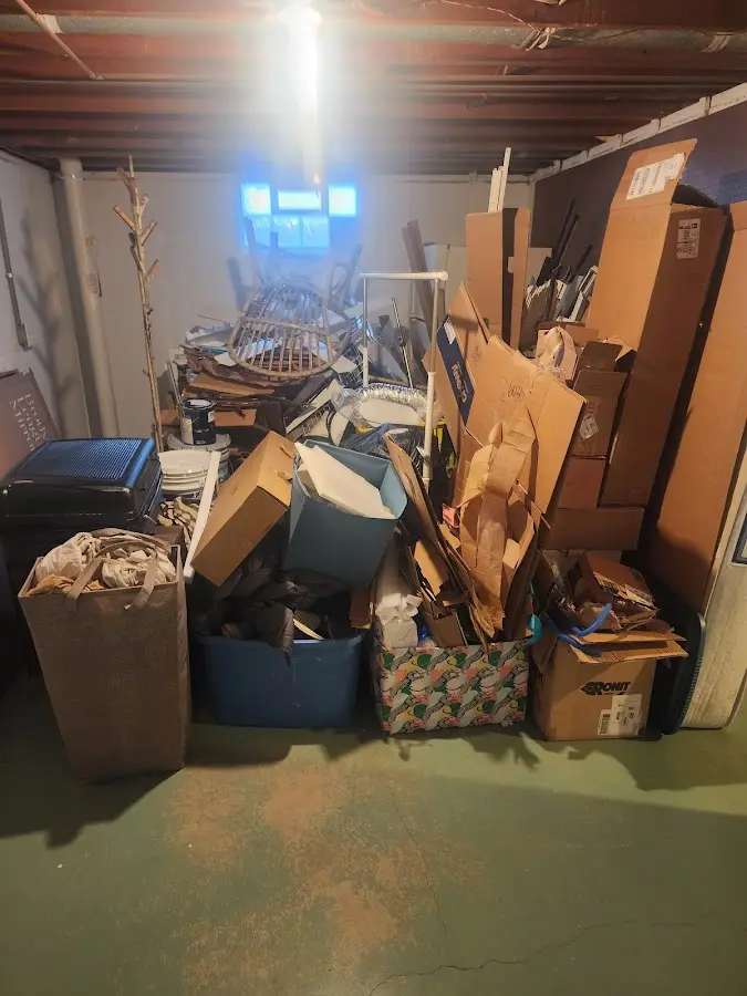 Roll-off dumpster container at job site for 15 Yard Dumpster Rental in Somerville